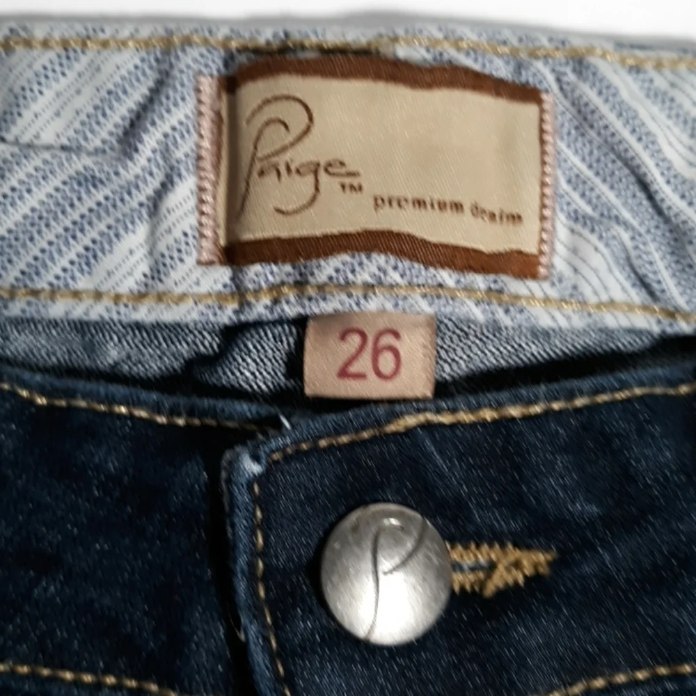 Paige 26 raw hem jeans boot cut